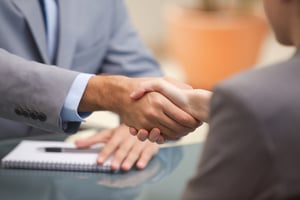 Two people shaking hands