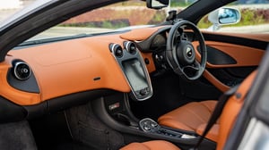interior of an orange sports car